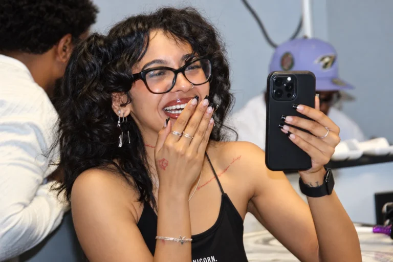 Audience laughing at a live comedy show, photographed by Dope Pixx