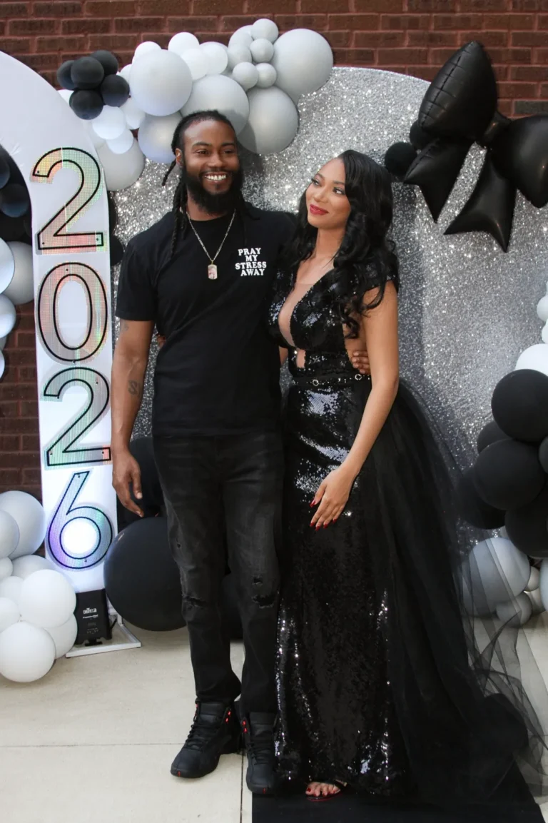 Prom couple in black formal wear
