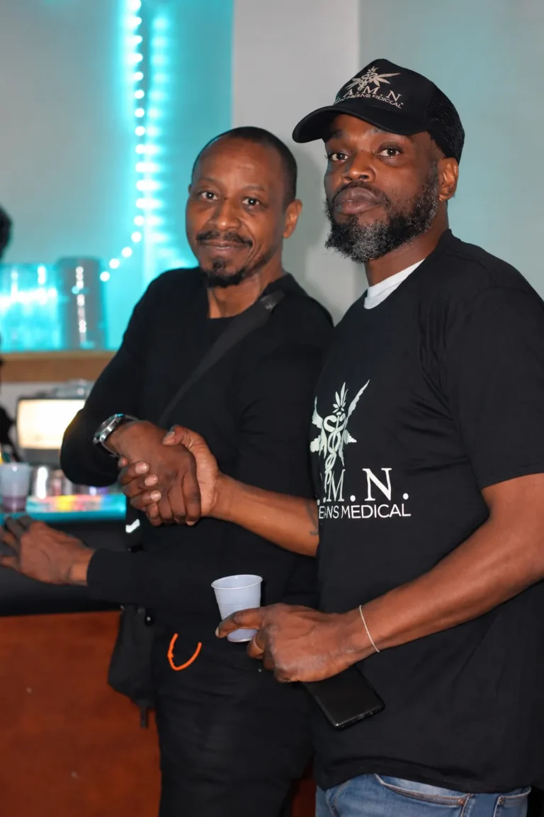 Teal Lit Handshake at the Club (1), Live Events